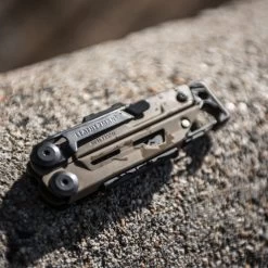 Leatherman Coyote Tan Signal Multi-Tool With Nylon Sheath 6 Leatherman Coyote Tan Signal Multi-Tool With Nylon Sheath -Sale Leatherman LT832720 Signal Coyote Tan Closed on Rock